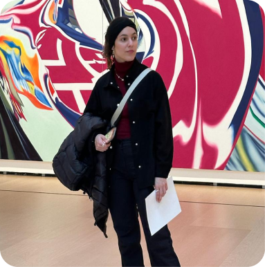 Ariel Delgado portrait in an art gallery